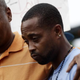 Michael Brown’s cousin Eric Davis and Louis Head, Brown’s stepfather, attend a news conference Aug. 15, 2014, in Ferguson, Mo.
Joshua LOTT/AFP/Getty Images